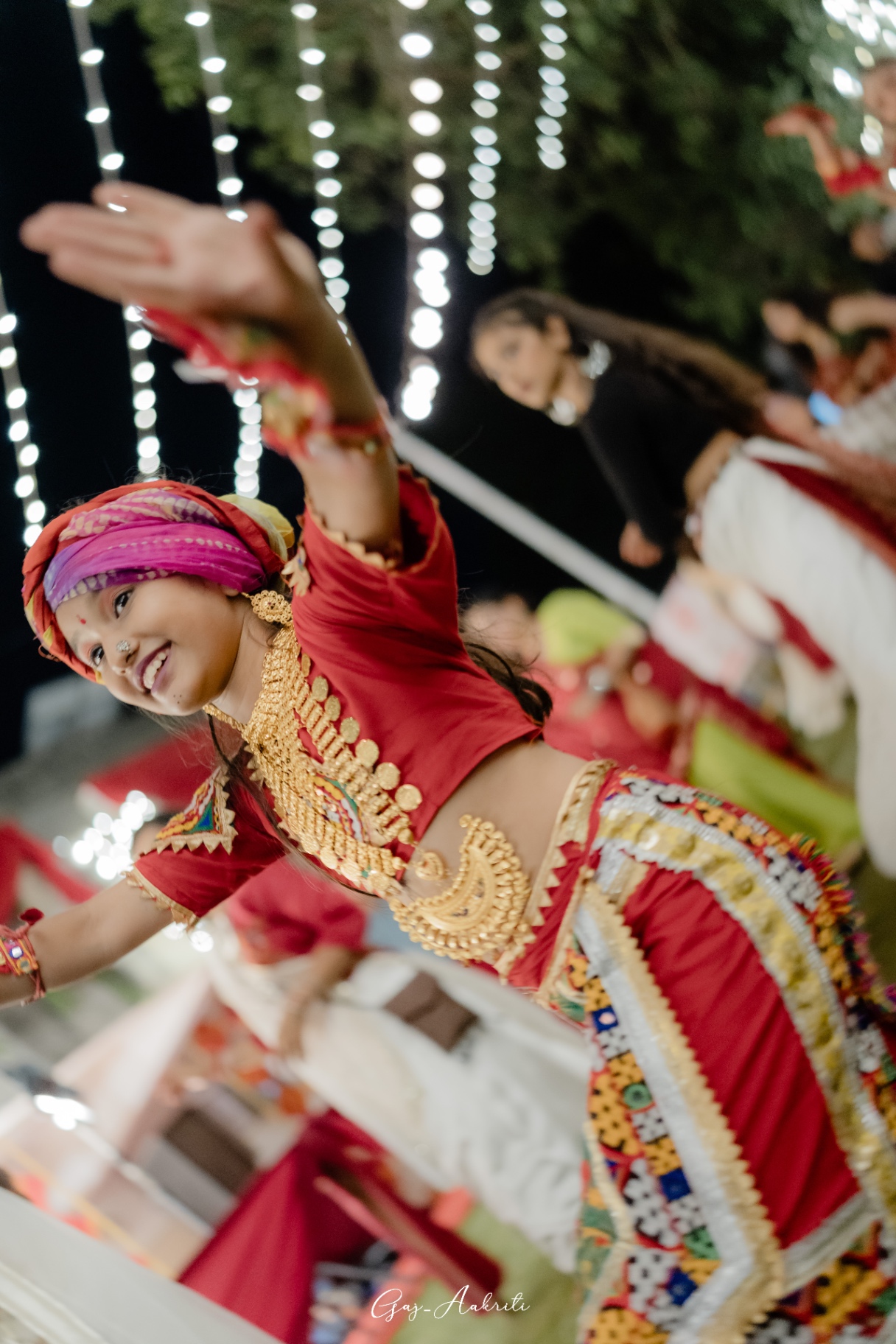 Young girl dancing garba
