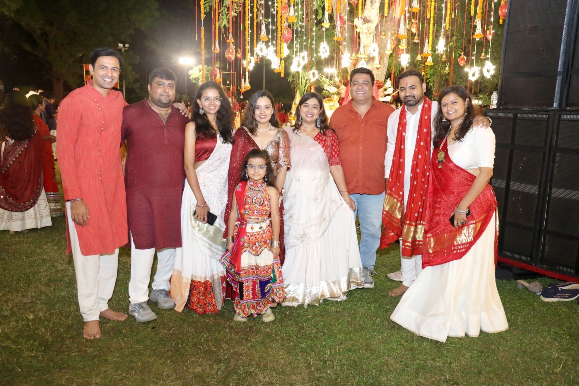 Family portrait near Durga decor