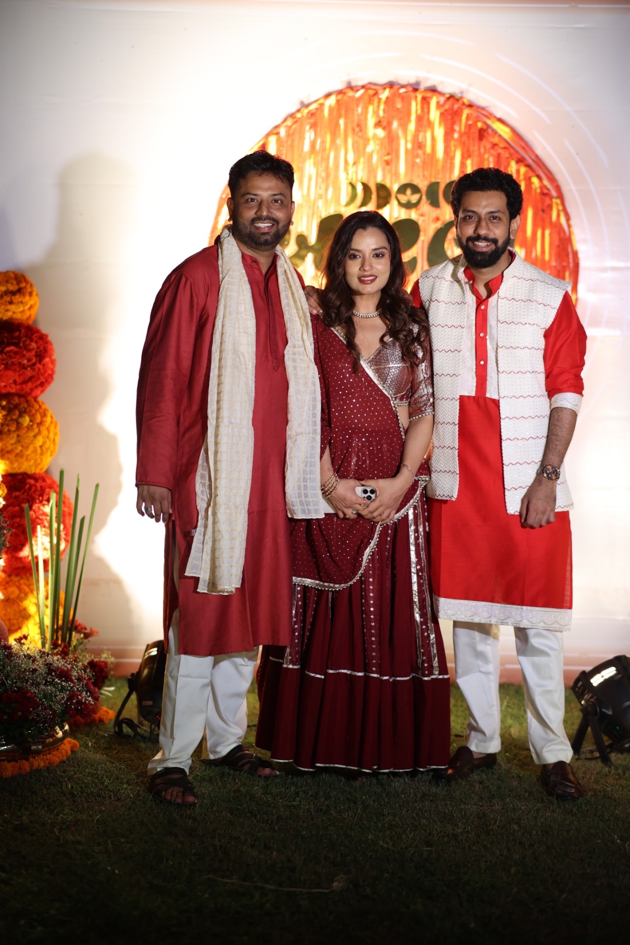 Portrait in red near Aarambh backdrop